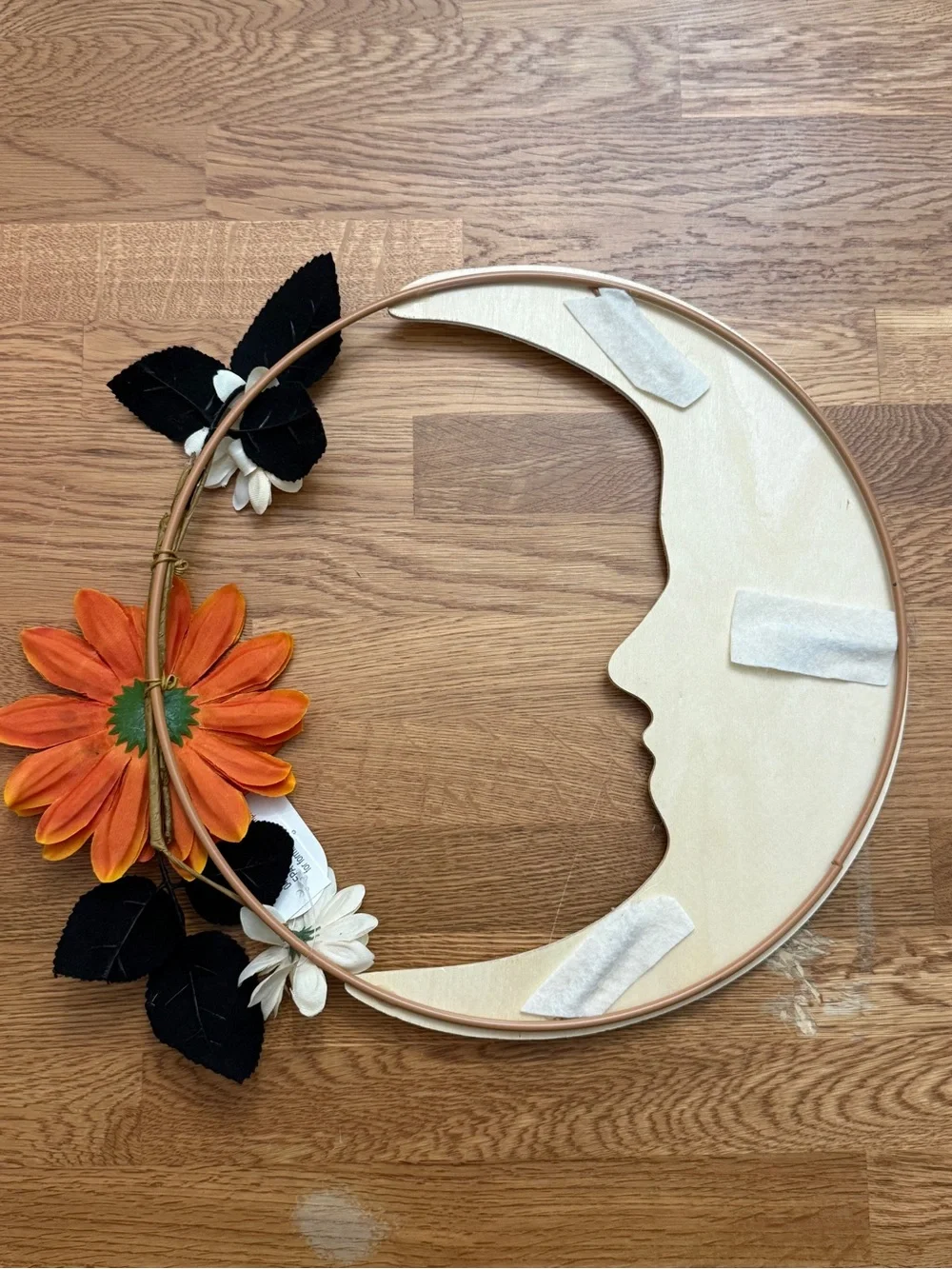 Wooden Crescent Moon Wreath with Orange Flowers